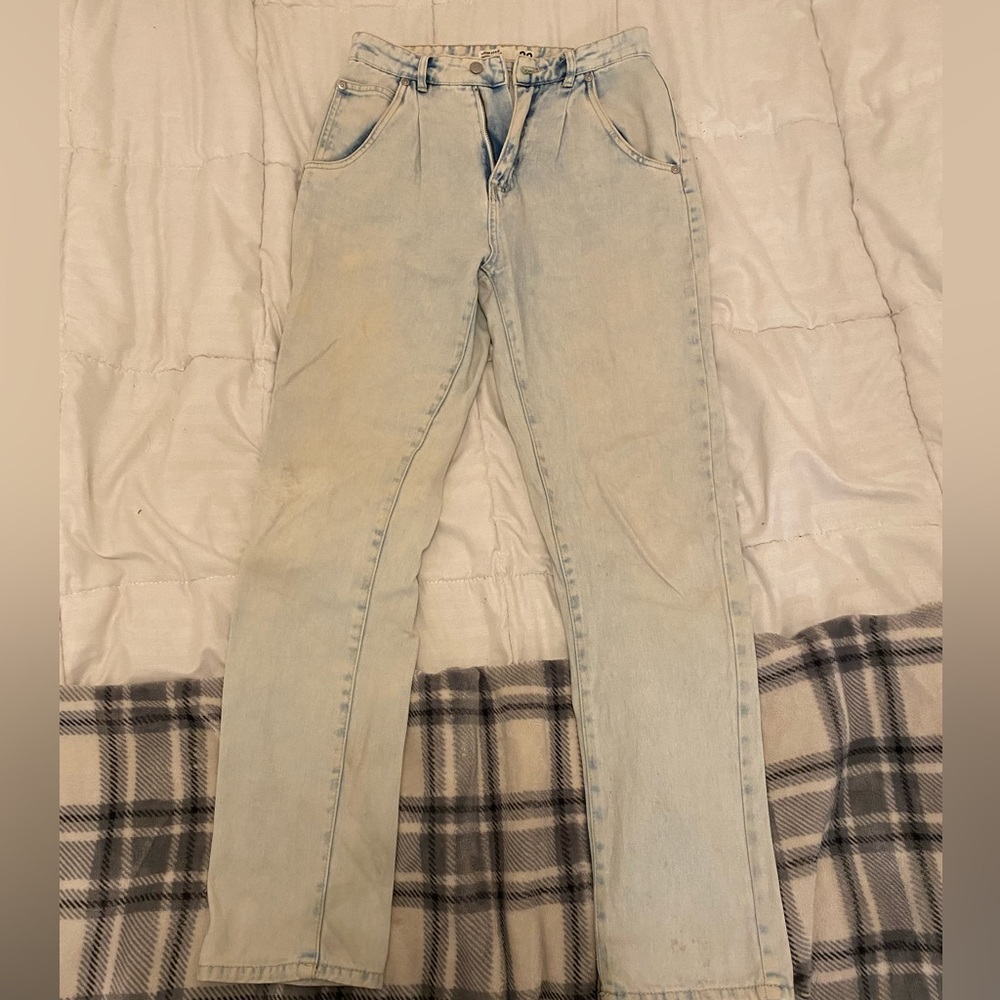 Selling these light washed jeans fit great, comfortable